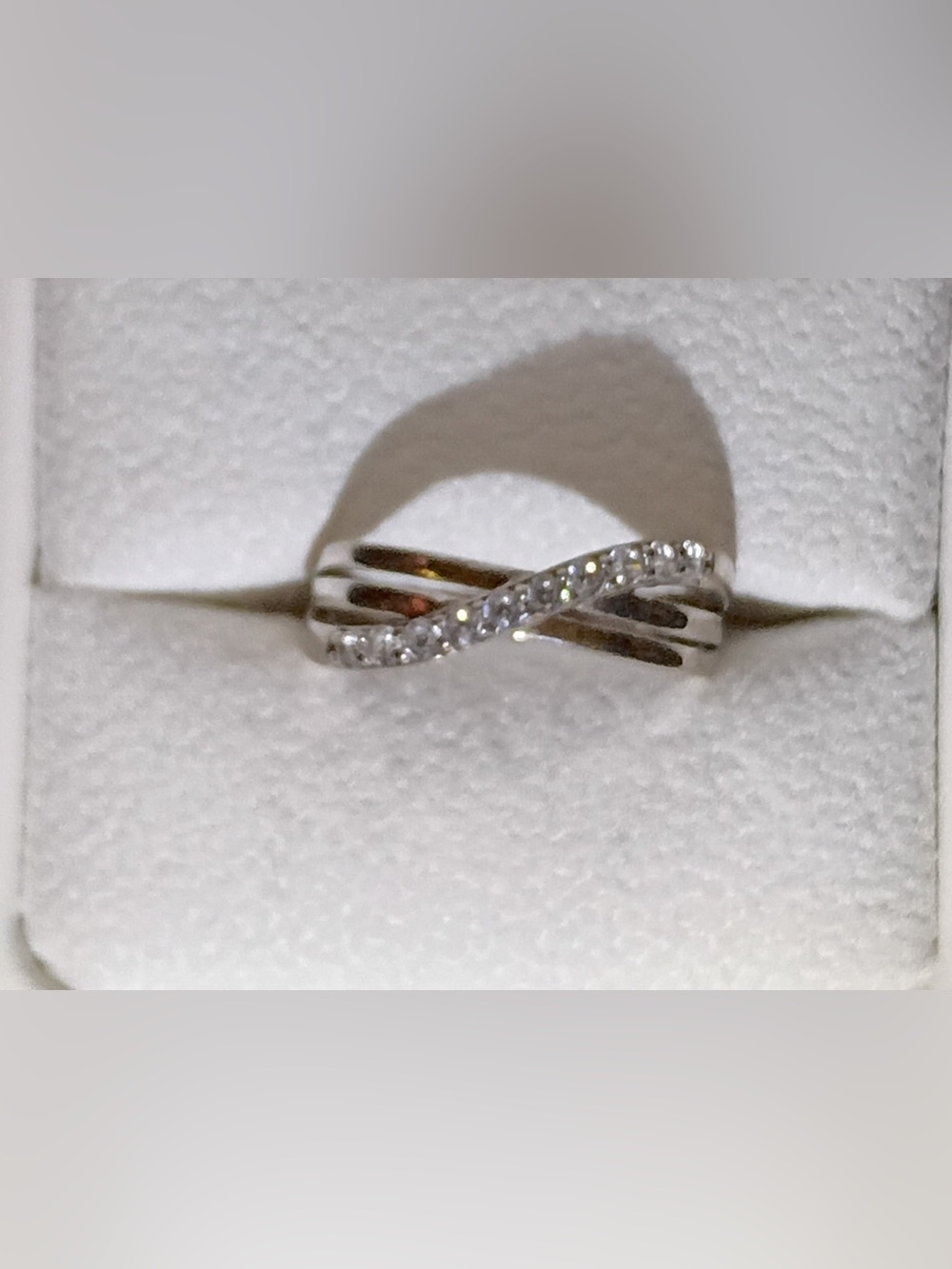 Sterling Silver Twisted Infinity Ring with Clear Stones - Silver